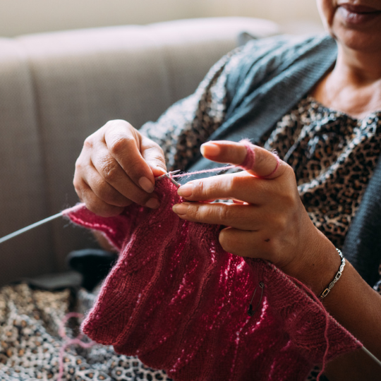 73_9282_15Mar2023153314_Close up of a womans hands with knitting needles 540px.png